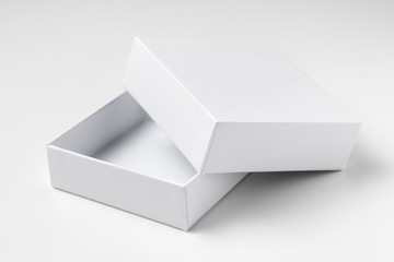 Close up white open cardboard gift box on white background isolated