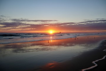 Fototapeta na wymiar orange beach sunset in Huntington Beach California
