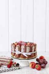 French charlotte cake with summer fruits.