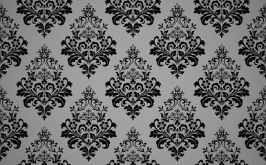 Obraz premium Wallpaper in the style of Baroque. Seamless vector background. Black and grey floral ornament. Graphic pattern for fabric, wallpaper, packaging. Ornate Damask flower ornament