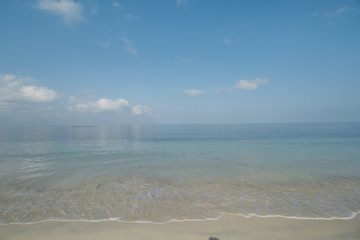 Clear Sea Water, White Sand, Cloudy Sky and Tropical Beach