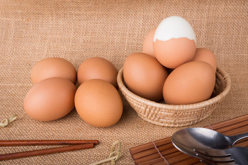 Set Eggs in a basket on  gunny (sackcloth)  background