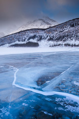 A frozen lake in the Rocky Mountains of Canada in Alberta