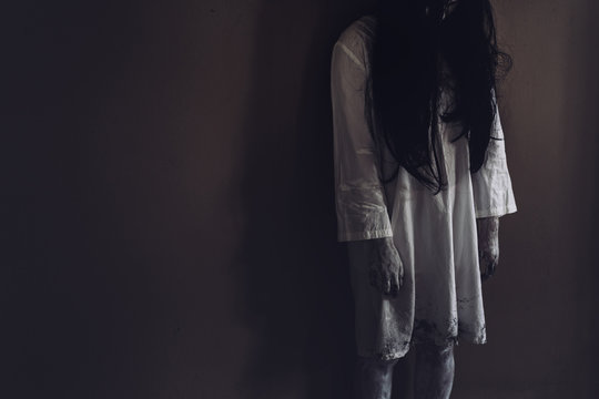 Horror scene of ghost woman death movie halloween festival in the dark house nightmare screaming on hell is monster devil girl or female dead characters at night evil dressing wraith spirit theme.