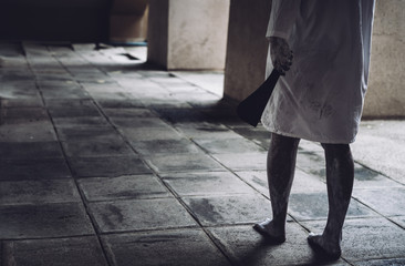 Horror of ghost woman hold knife death movie halloween festival in the dark house nightmare screaming on hell is monster devil girl or female dead characters at night evil dressing wraith spirit theme