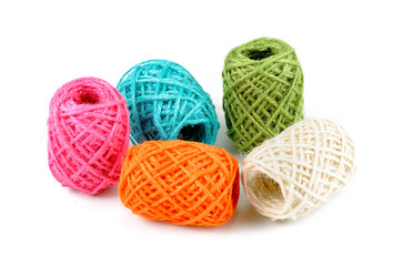 Skein of natural jute twine isolated on white.