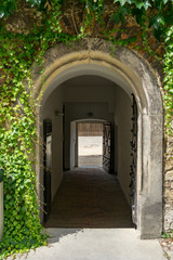 Fototapeta na wymiar doorway out of the inner yard of wolfsburg castle, germany