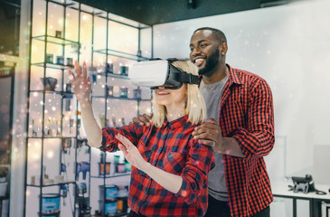 International students resting together with glasses of virtual reality - future technology concept.