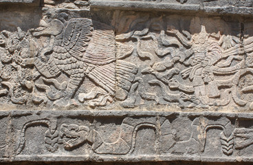 Bas-relief carving of eagle, chieftain and snake, Chichen Itza, Mexico