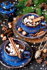 Cup of creamy hot chocolate with melted marshmallows