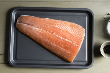 Raw salmon on a tray food photography recipe idea
