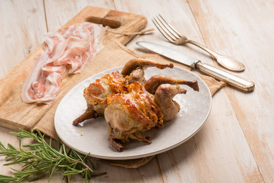 baked quail bacon wrapped and rosemary