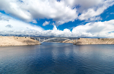 Sky with clouds and summer day, Pag bridge in Croatia