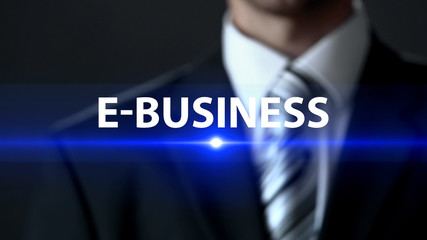E-business, man in business suit standing in front of screen, online technology