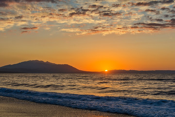 Fototapeta premium Early morning , dramatic sunrise over sea and mountain. Photographed in Asprovalta, Greece.