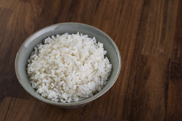 Cooked rice in vintage ceramic bowl