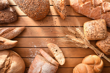 Whole loaf of bread on cutting board traditional vintage