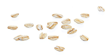 Oat flakes isolated on white background. Close up.