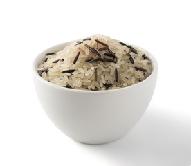 Raw Dry Black Wild Rice and Parboiled White Rice Isolated