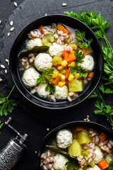 Delicious vegetable soup with chicken meatballs and pearl barley