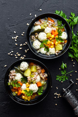 Delicious vegetable soup with chicken meatballs and pearl barley