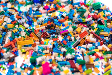 Fototapeta na wymiar Colorful plastic building blocks for kids learning.