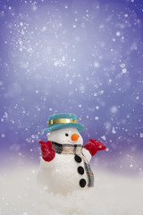 A snowman  on bokeh with copy space for season greeting Merry Christmas, AF point selection
