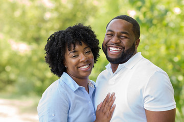 Portrait of a happy African American couple smiling.