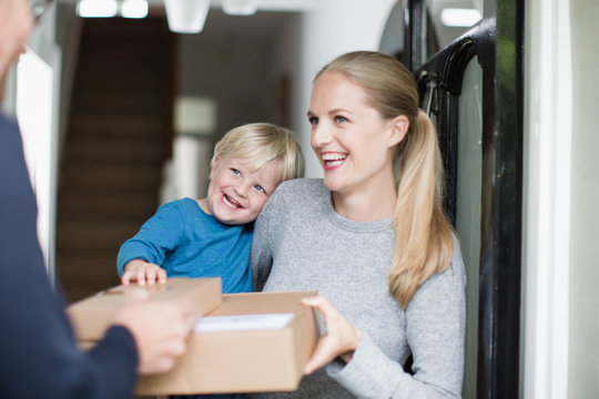 Young family receiving a home delivery