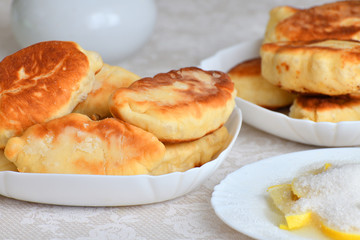 fried cakes with a lemon and sugar
