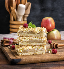 stack of baked slices of pie with apples