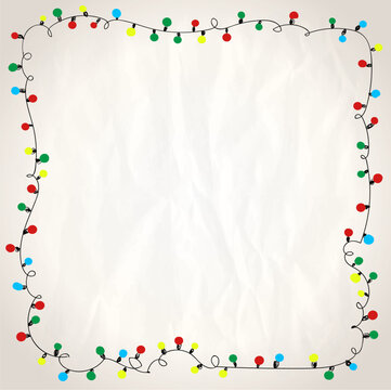 Simple frame with garland lights against paper background