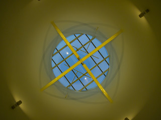 glass dome with wooden beams and lighting