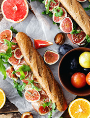 Sandwich prosciutto mascarpone cheese figs top view