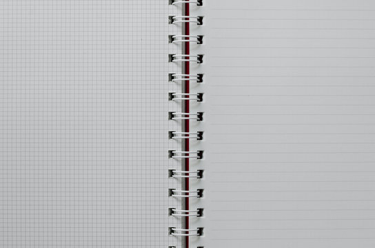 Wirebound Notebook Open with Lined and Grid Paper.