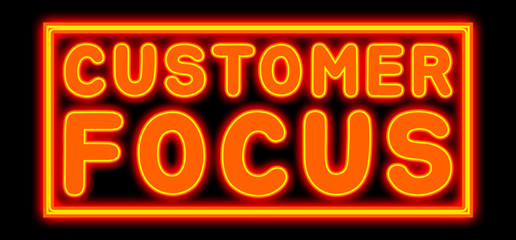 Customer Focus - glowing text on black background