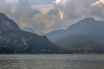 Scenic cloudy landscape before sunset on Lake Como, northern Italy.