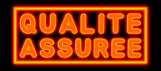 Qualite Assuree - glowing text on black background