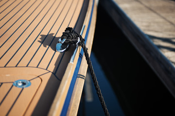Moored sailboat at the harbor close up