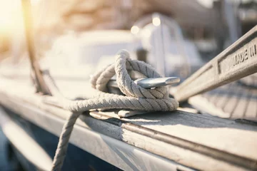 Fotobehang Mooring rope and bollard at the harbor © StockPhotoPro