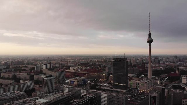 Wide and high aerial shot of Berlin on a cloudy morning.