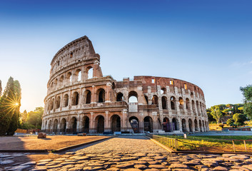 Rome, Italy. The Colosseum or Coliseum at sunrise.