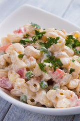Homemade macaroni salad with vegetables