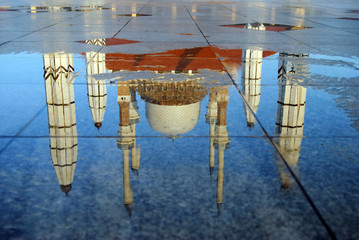 Reflection of The great mosque of Central Java, Semarang, Indonesia in the morning.