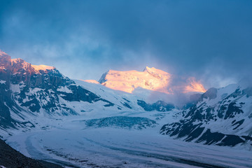 Obraz premium Scenic view of beautiful landscape of Swiss Alps with a majestic Glacier de Corbassiere, Switzerland.