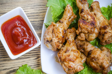 fried chicken wings and sauce