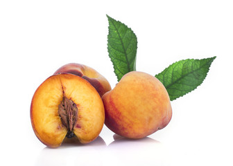 peach with leaf isolated on white