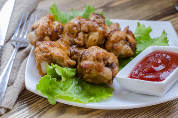 fried chicken wings and sauce