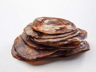 montón de lonchas de cerdo ibérico apiladas