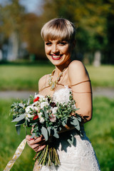 portrait of a bride with a short haircut